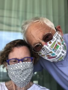 Store co-founders Judy Blume and George Cooper, wearing face masks 