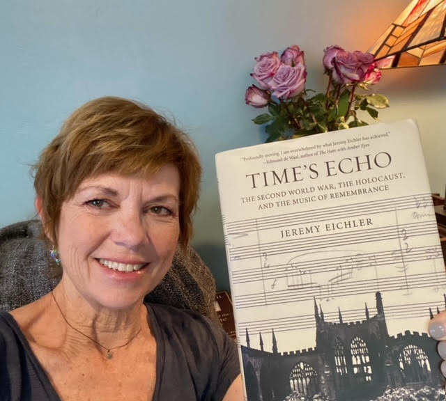 Bookseller Leslie with a copy of Time’s Echo: The Second World War, the Holocaust, and the Music of Remembrance by Jeremy Eichler